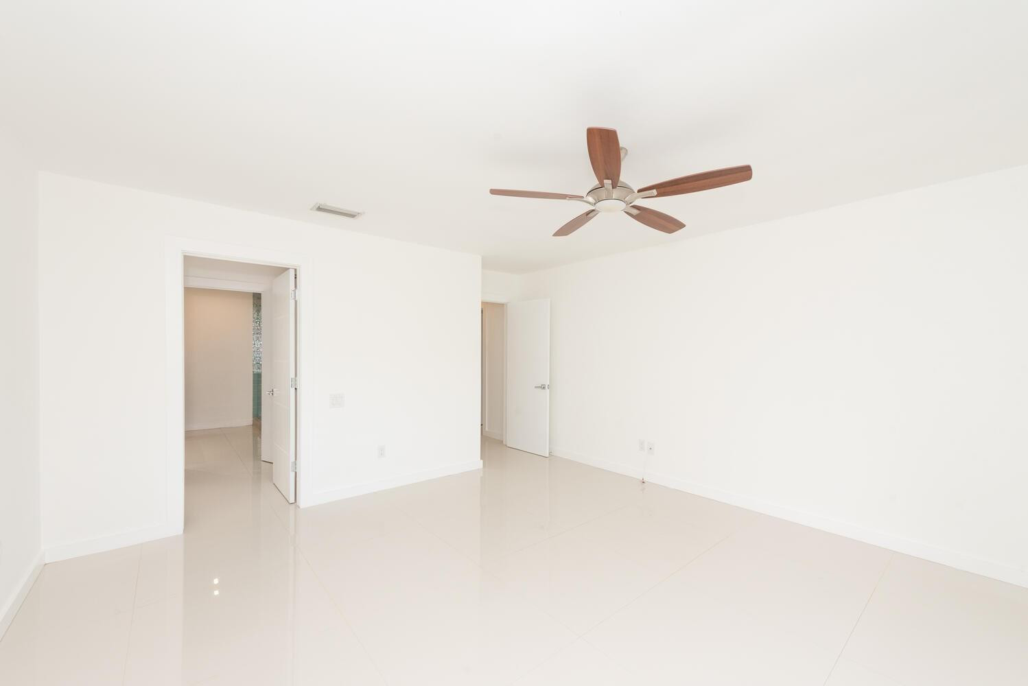 6604 Southwest 114th Place, Unit C72 Miami, FL 33173 - Photo 16 of 28 a view of a room with a ceiling fan