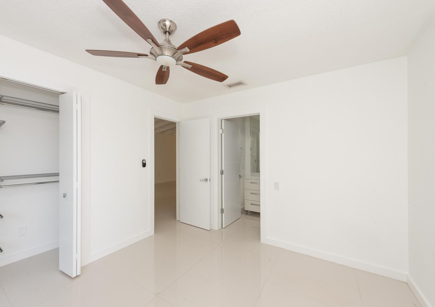 6604 Southwest 114th Place, Unit C72 Miami, FL 33173 - Photo 25 of 28 a view of an empty room