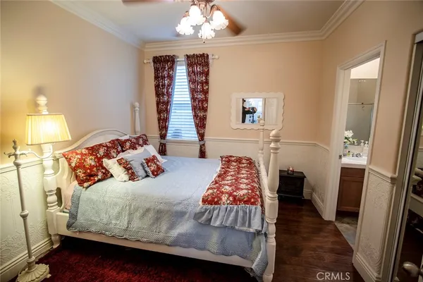 a view of a porch with furniture and floor to ceiling window