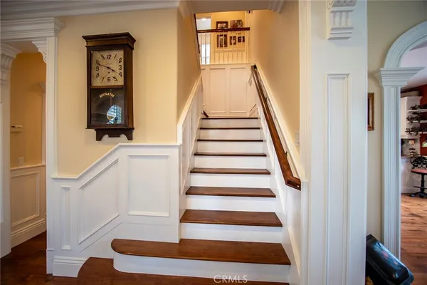 a bathroom with 2 sink and a mirror