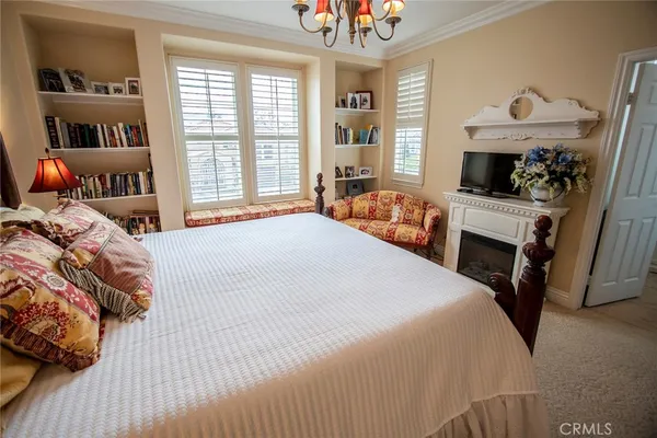 a bedroom with a bed and furniture