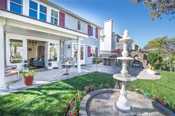 a view of a back yard of the house