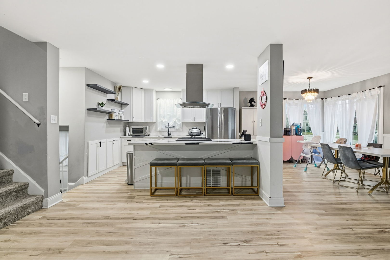 825 Cherry Lane Thornton, IL 60476 - Photo 4 of 37 a kitchen with kitchen island granite countertop a sink cabinets and stainless steel appliances