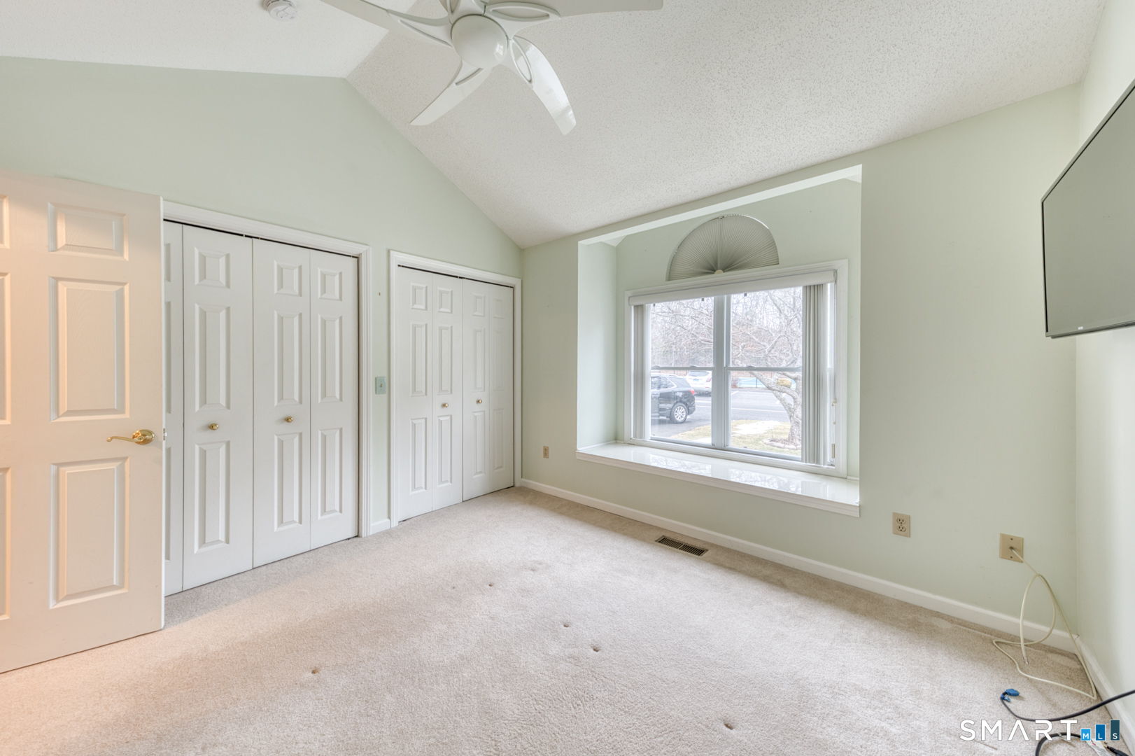 811 Village Road, Unit 811 Southington, CT 06489 - Photo 18 of 40 a view of an empty room with a window