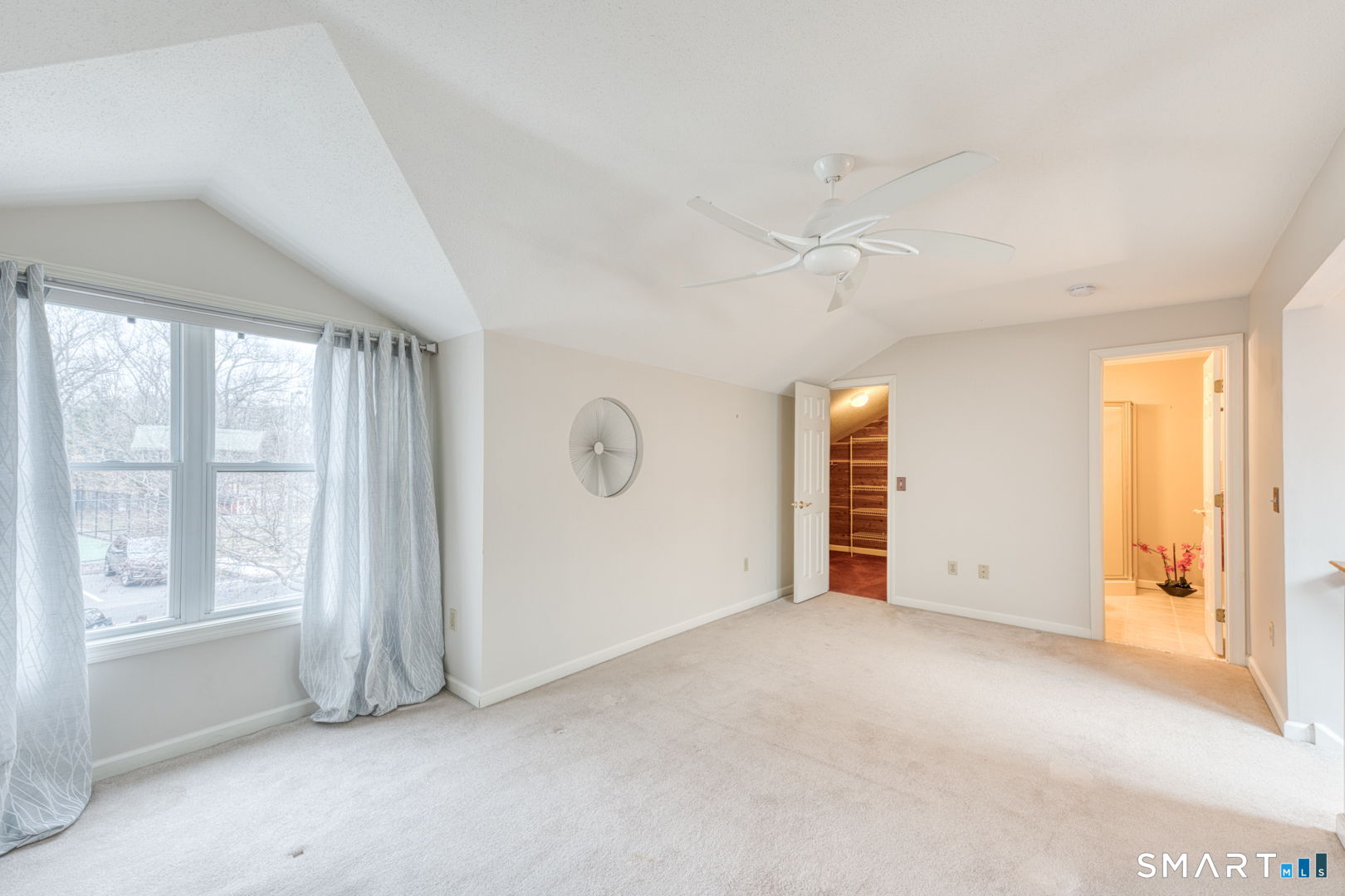 811 Village Road, Unit 811 Southington, CT 06489 - Photo 20 of 40 an empty room with windows and closet area