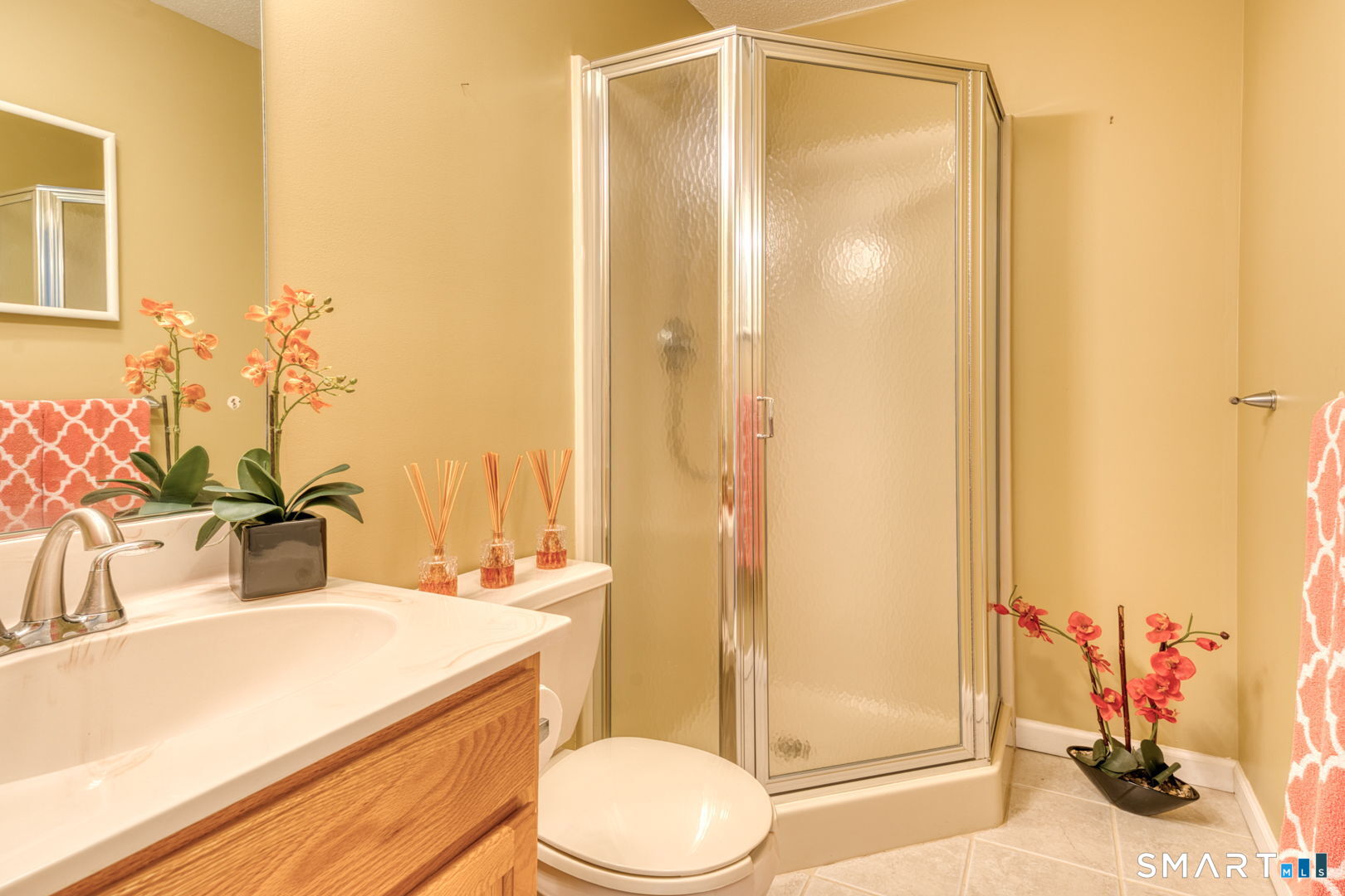 811 Village Road, Unit 811 Southington, CT 06489 - Photo 22 of 40 a bathroom with a sink a toilet and shower