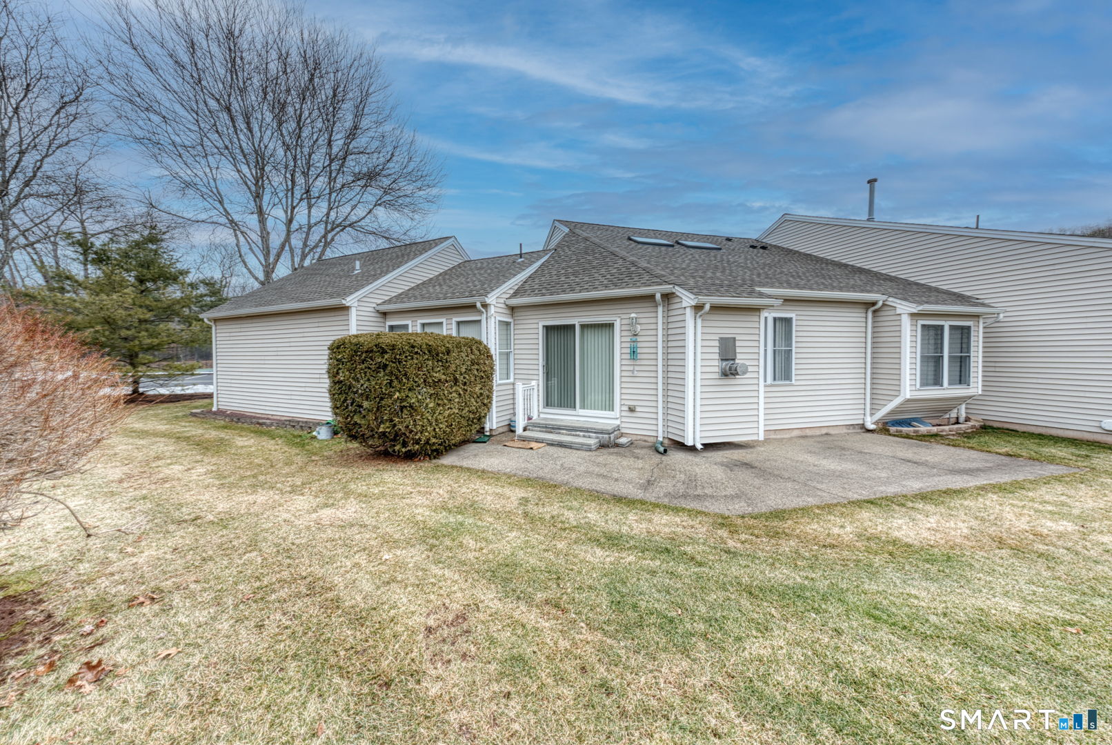 811 Village Road, Unit 811 Southington, CT 06489 - Photo 31 of 40 a view of a house with a backyard