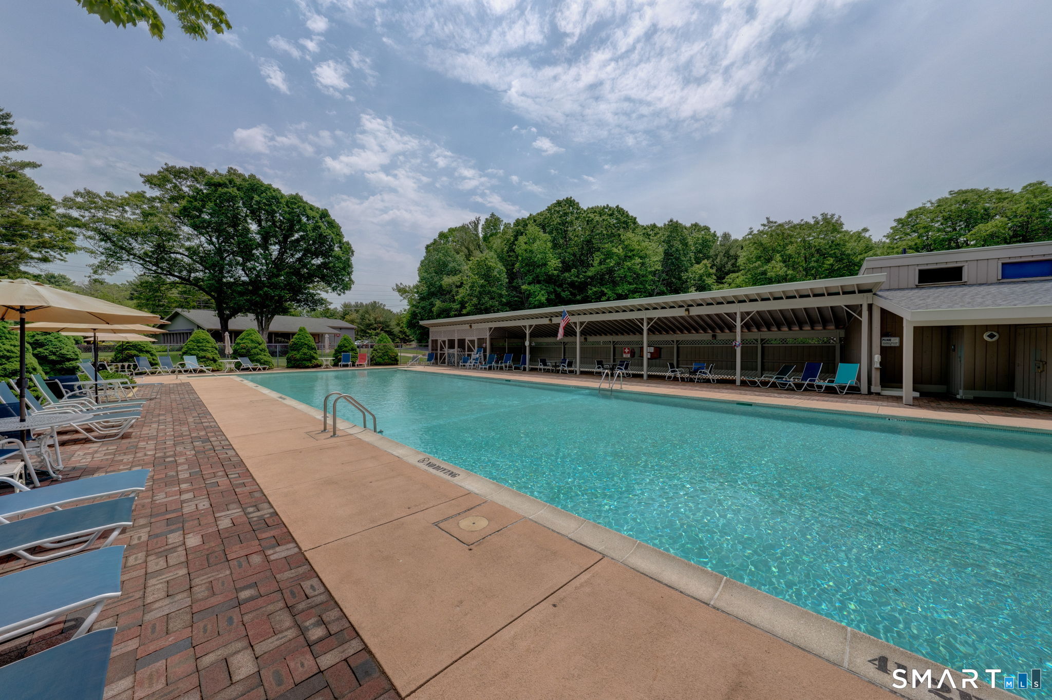 811 Village Road, Unit 811 Southington, CT 06489 - Photo 37 of 40 a view of house with swimming pool and yard in the back