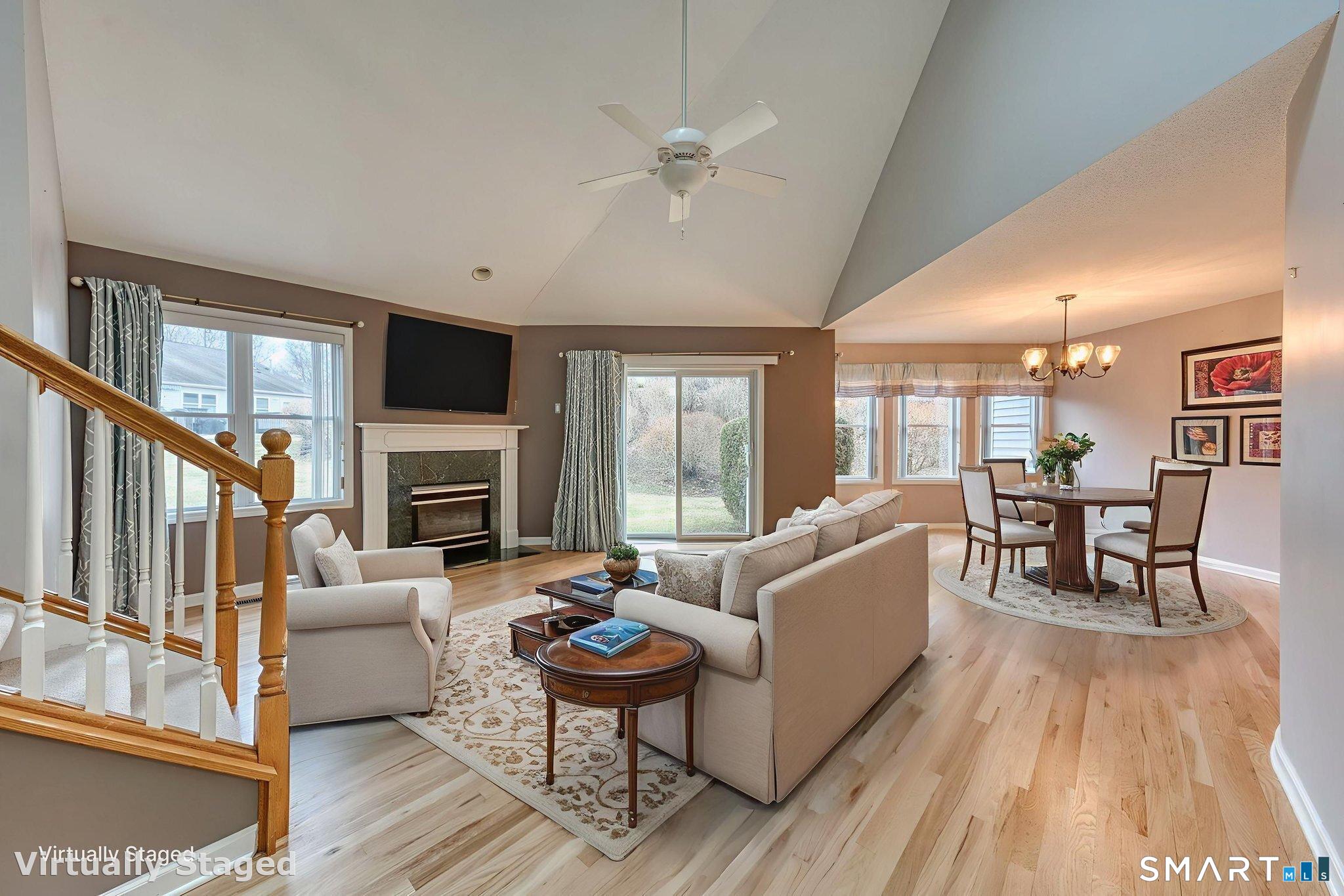 811 Village Road, Unit 811 Southington, CT 06489 - Photo 7 of 40 a living room with furniture and a fireplace
