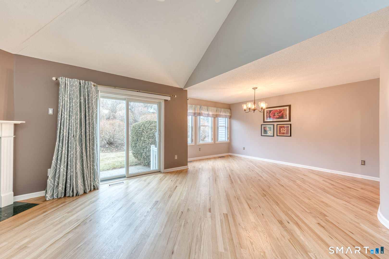 811 Village Road, Unit 811 Southington, CT 06489 - Photo 8 of 40 wooden floor in an empty room with a window