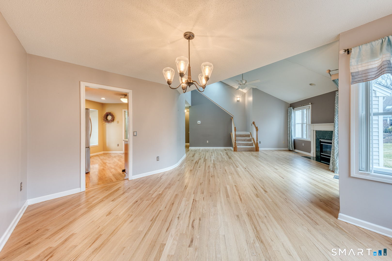 811 Village Road, Unit 811 Southington, CT 06489 - Photo 10 of 40 a view of a livingroom with a chandelier