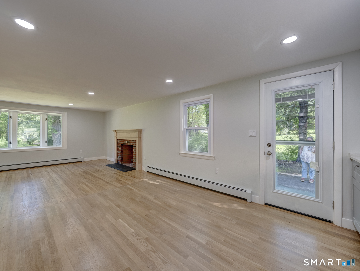 70 Doubleday Road Columbia, CT 06237 - Photo 21 of 39 View From Kitchen Into Living Room
