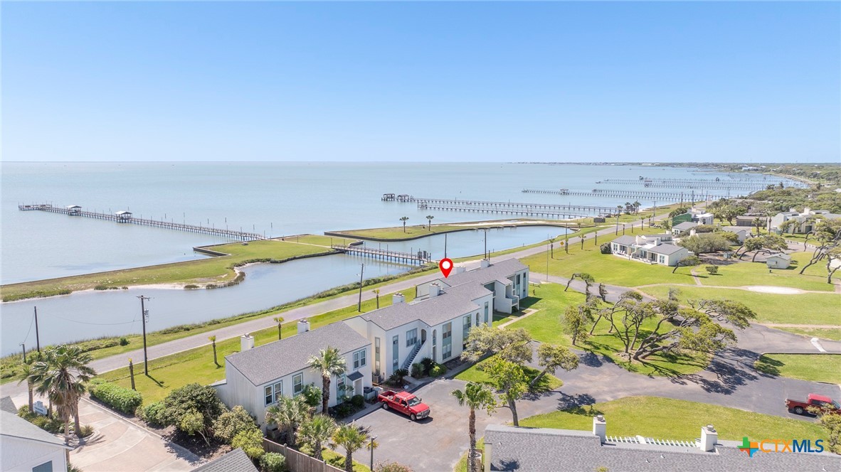 2003 North Fulton Beach Road, Unit 77 Rockport, TX 78382 - Photo 2 of 33 an aerial view of a city