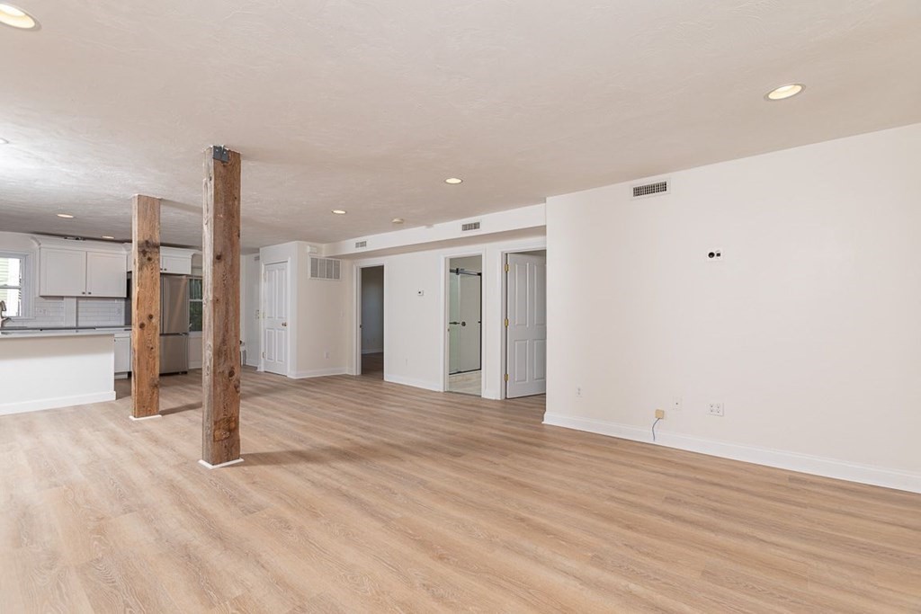 4 Farragut Road, Unit 1 Ipswich, MA 01938 - Photo 6 of 13 a view of a livingroom with wooden floor