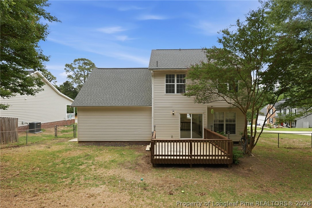 5113 Archer Road Hope Mills, NC 28348 - Photo 41 of 41 a view of a deck with a garden