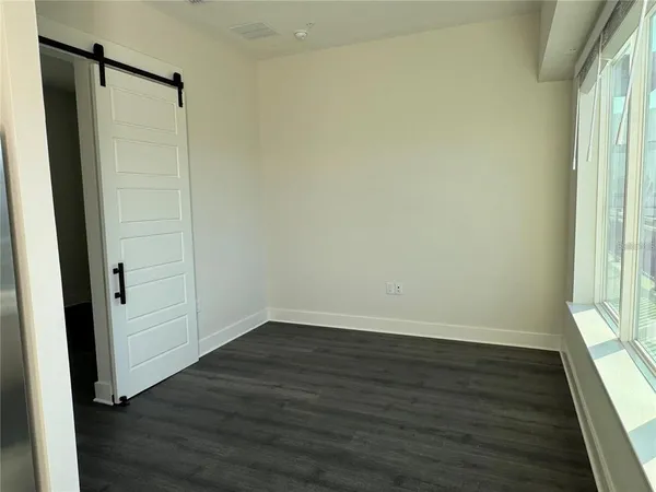 a bathroom with a sink toilet and vanity