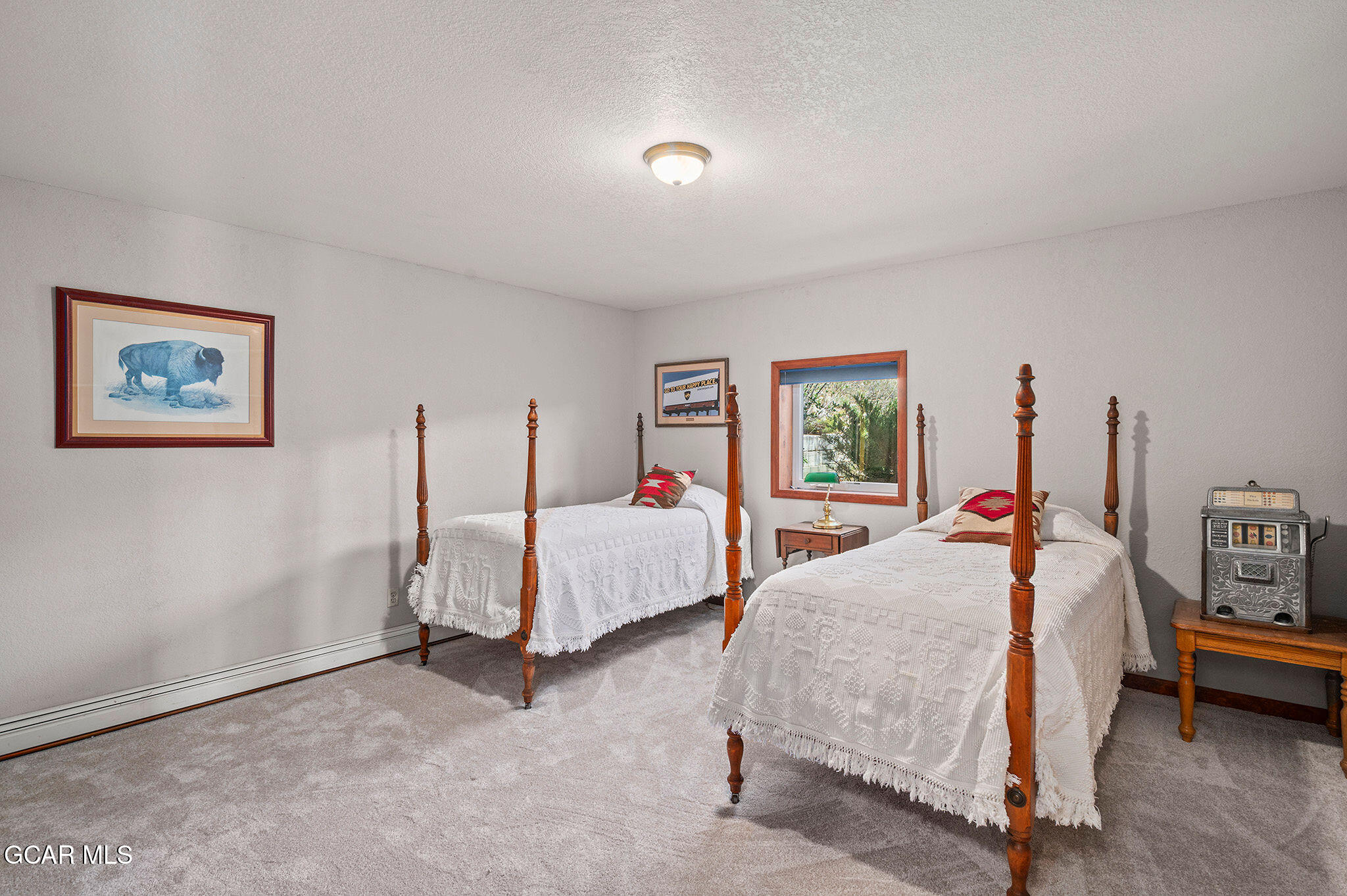 732 Gcr 8311/ Clayton Ranch Road Tabernash, CO 80478 - Photo 44 of 65 a bed room with a bed and two tables