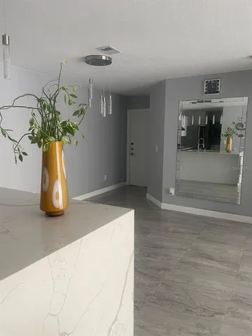 a vase of flowers sitting on a table