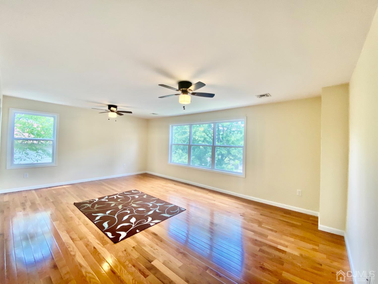91 Holly Road Iselin, NJ 08830 - Photo 15 of 25 a view of an empty room and window