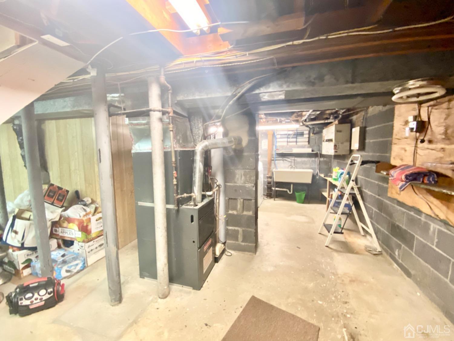 91 Holly Road Iselin, NJ 08830 - Photo 23 of 25 a view of a room with gym equipment