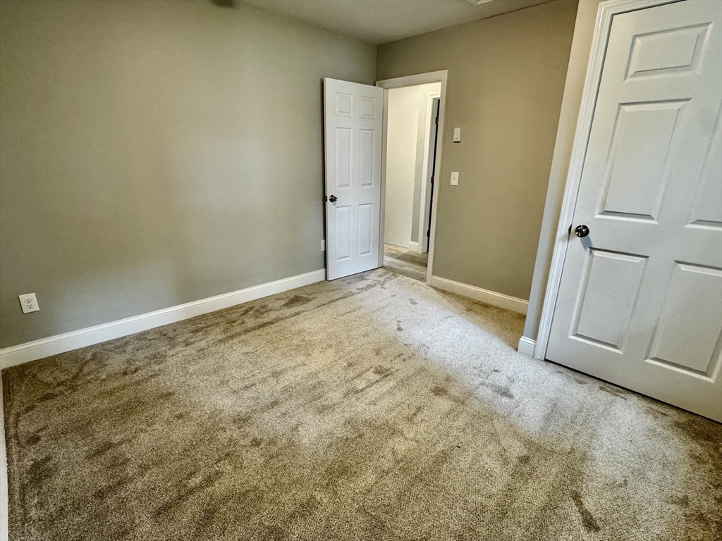 27 R Monroe Street Taunton, MA 02780 - Photo 17 of 25 an empty room with closet area