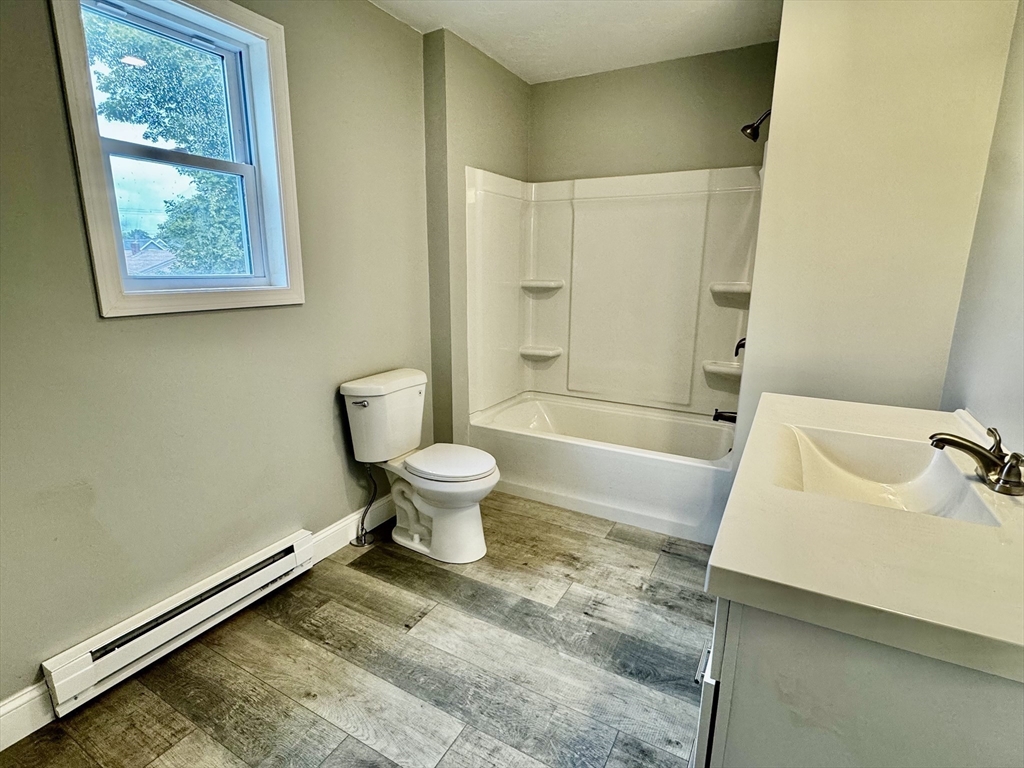 27 R Monroe Street Taunton, MA 02780 - Photo 21 of 25 a bathroom with a sink toilet and shower