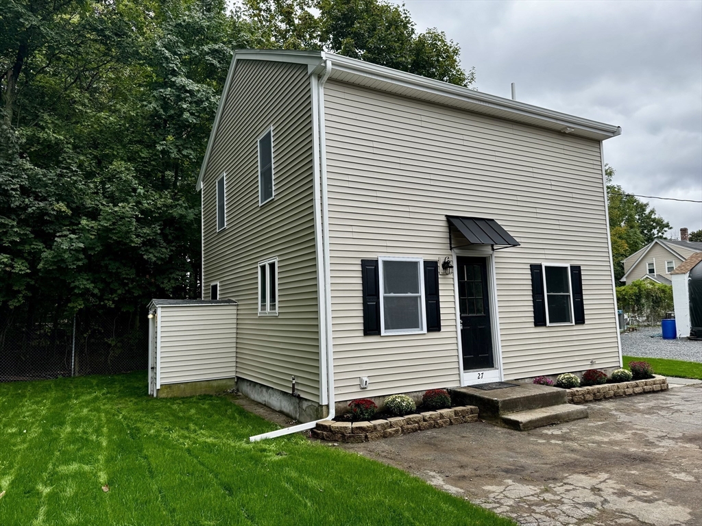27 R Monroe Street Taunton, MA 02780 - Photo 22 of 25 a view of a house with a yard