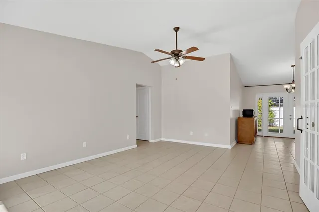 a kitchen with a sink stainless steel appliances cabinets and a counter top space
