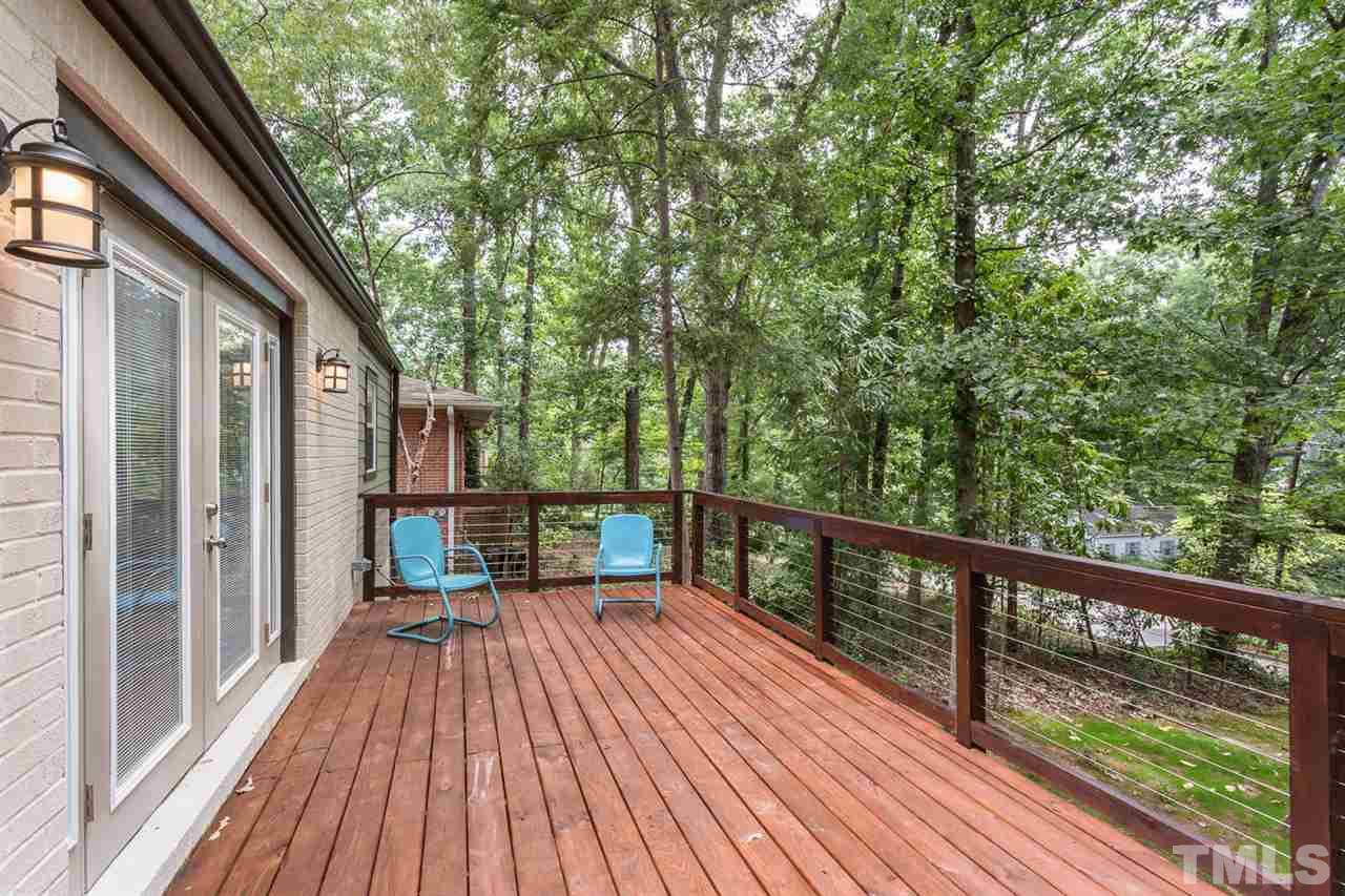 409 Stacy Street Raleigh, NC 27607 - Photo 4 of 25 a view of balcony of the house