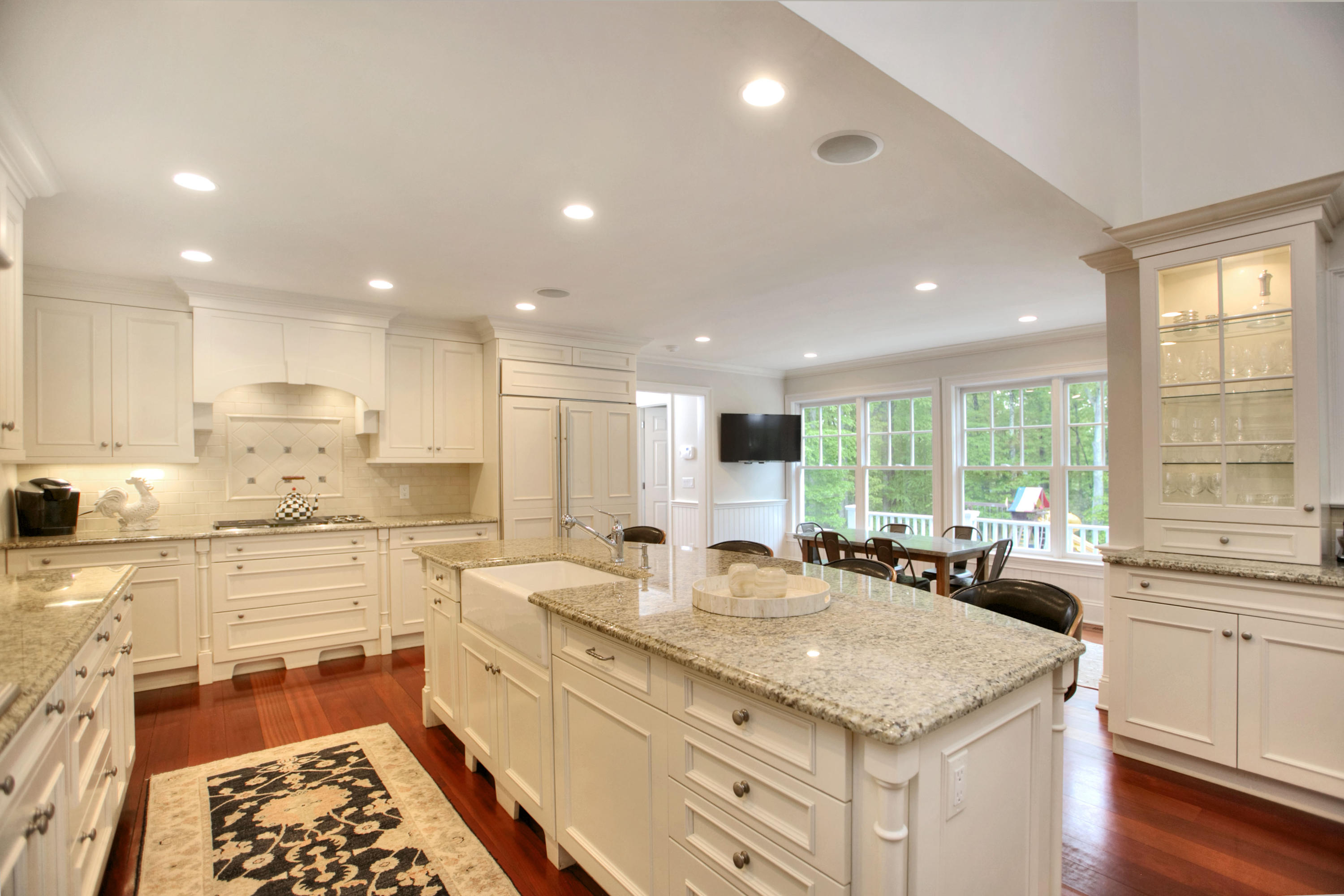 786 Cheese Spring Road New Canaan, CT 06840 - Photo 11 of 36 a kitchen with stainless steel appliances granite countertop a sink stove and cabinets