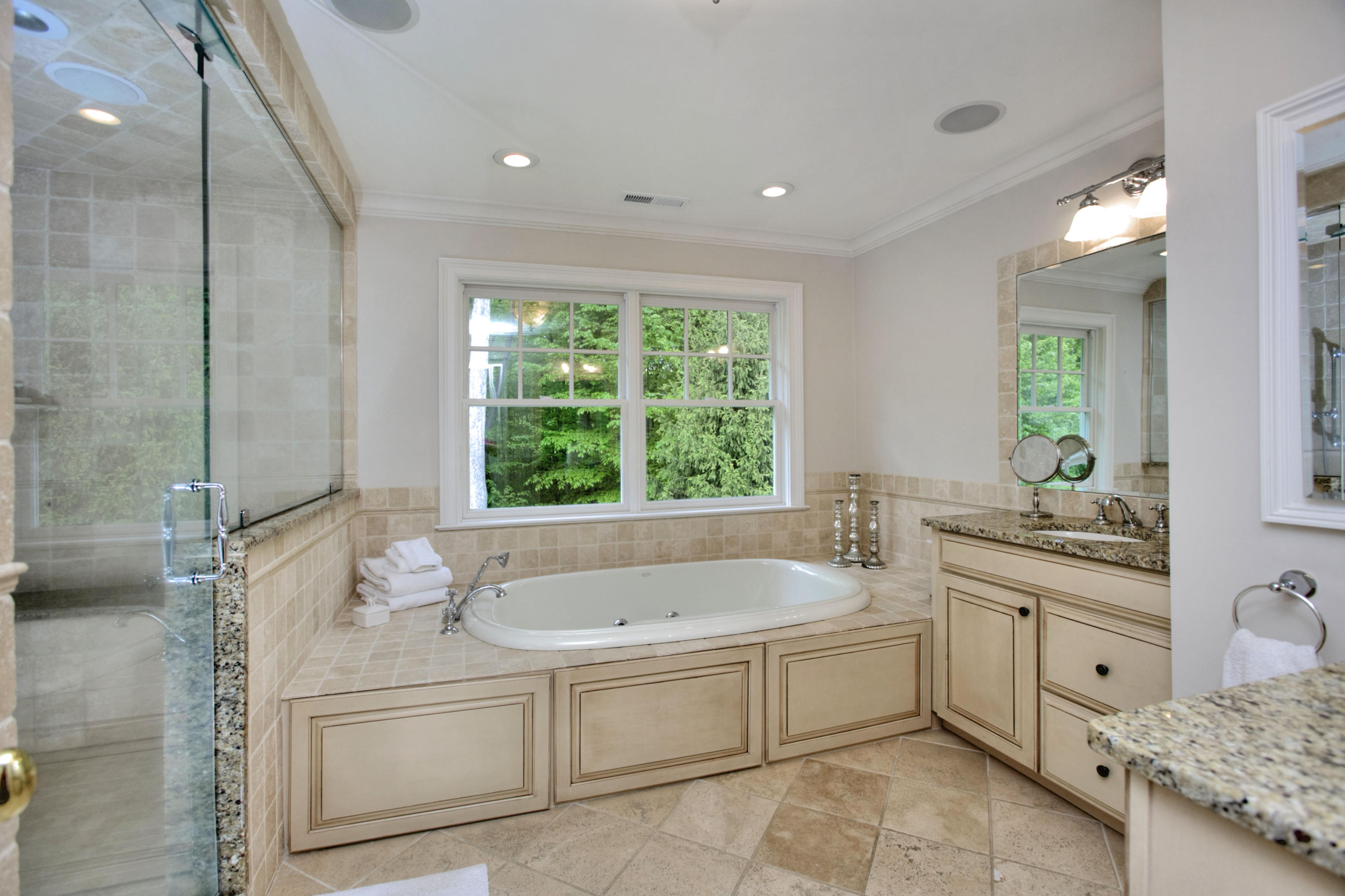 786 Cheese Spring Road New Canaan, CT 06840 - Photo 17 of 36 a spacious bathroom with a tub sink and mirror