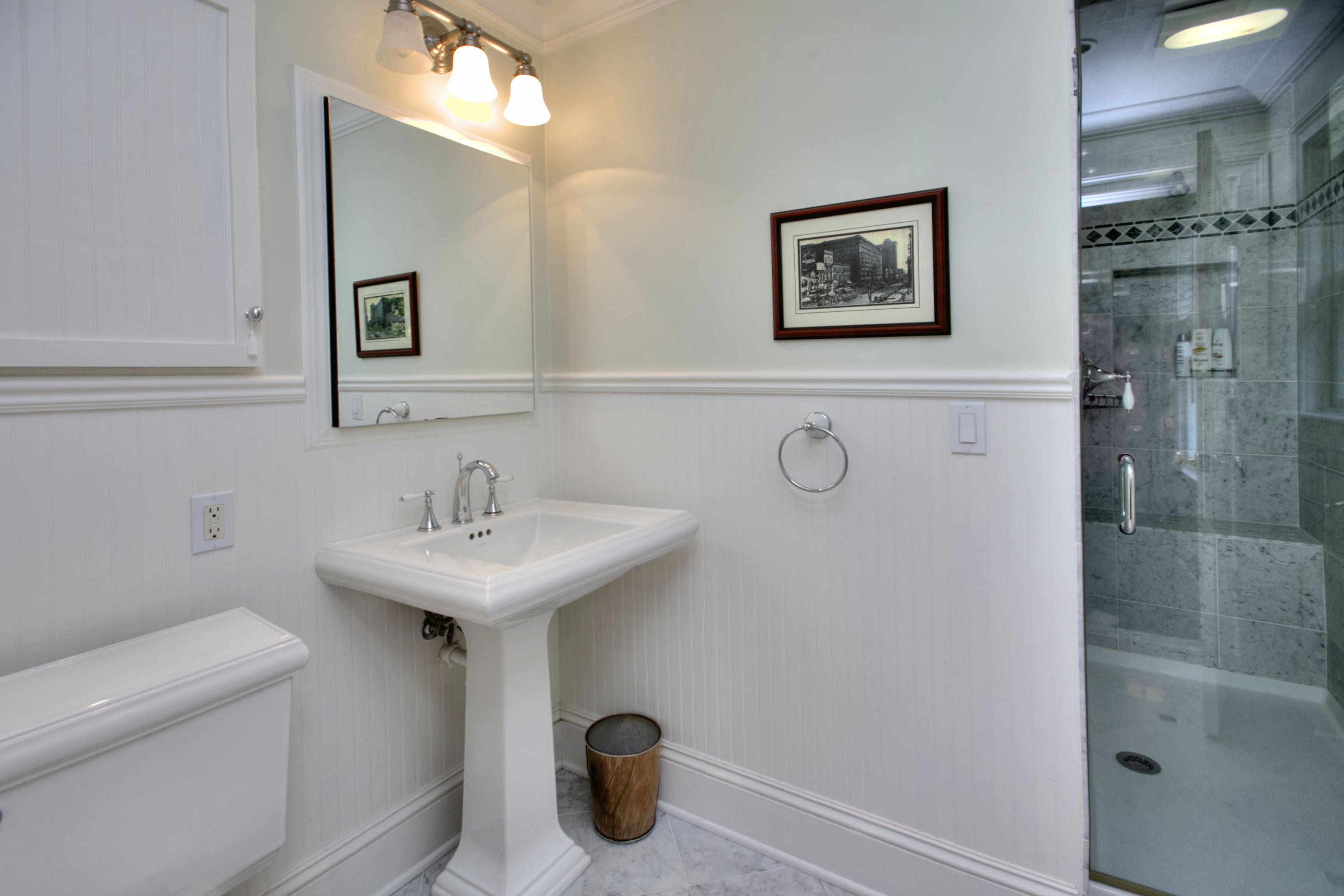 786 Cheese Spring Road New Canaan, CT 06840 - Photo 22 of 36 a bathroom with a sink a toilet and mirror