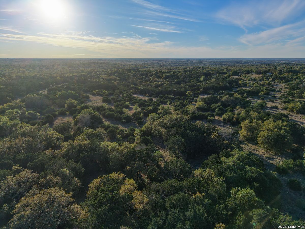 870 Rocky Top Road Southwest Hunt, TX 78024 - Photo 7 of 28 an aerial view of residential building and green space