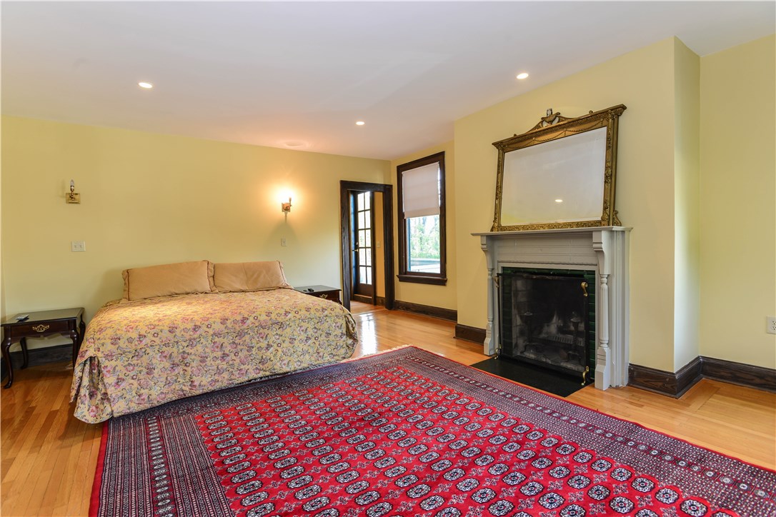 80 Kay Street Newport, RI 02840 - Photo 20 of 39 Large master bedroom with a lovely en-suite bathroom, laundry, and balcony