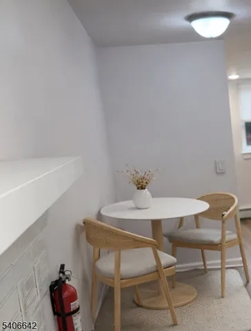 a view of a workspace with furniture