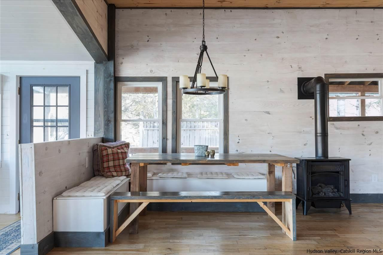 212 Trout Brook Road Roscoe, NY 12776 - Photo 15 of 35 a living room with furniture and a window