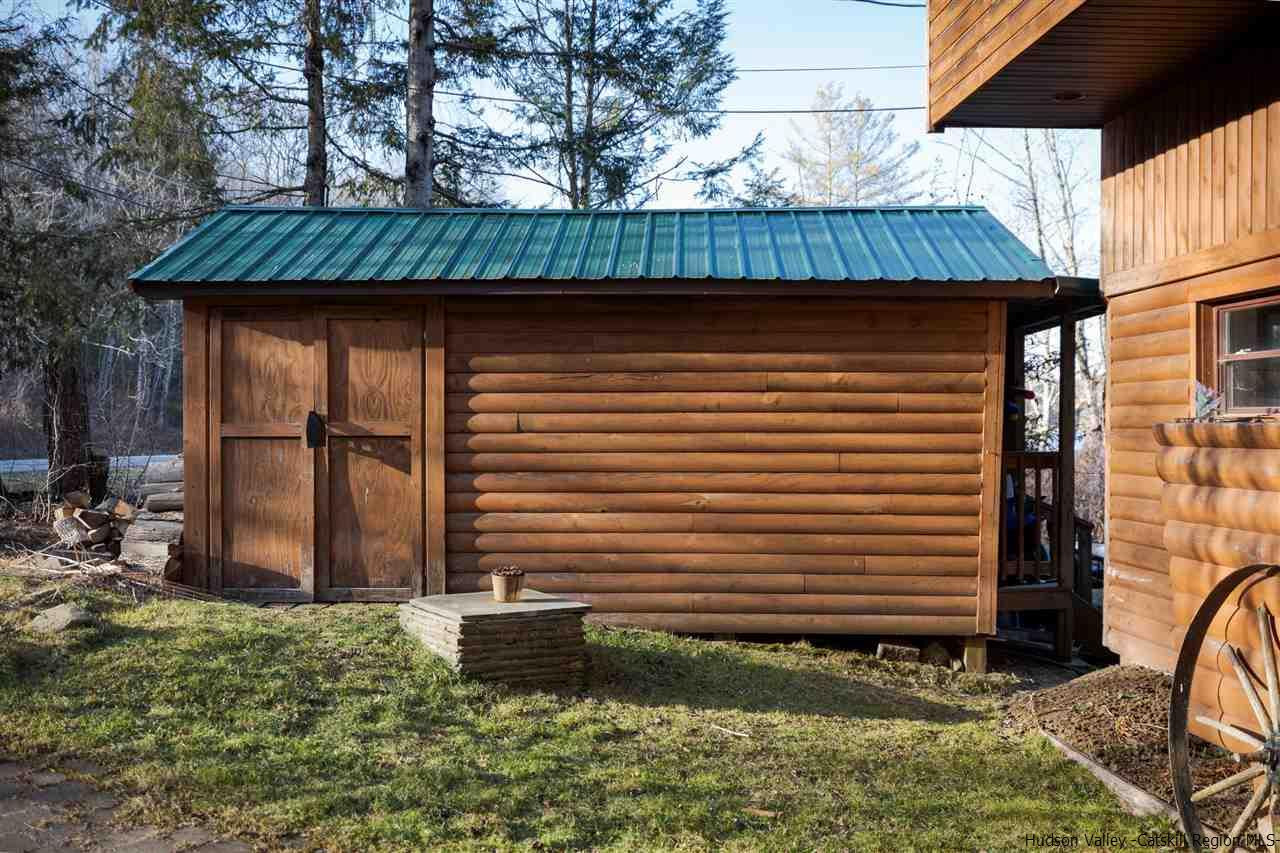 212 Trout Brook Road Roscoe, NY 12776 - Photo 32 of 35 a front view of a house with garden