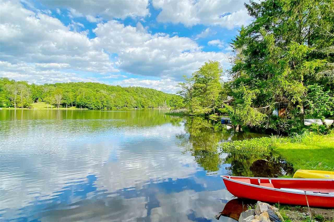 212 Trout Brook Road Roscoe, NY 12776 - Photo 34 of 35 a view of a lake with a yard
