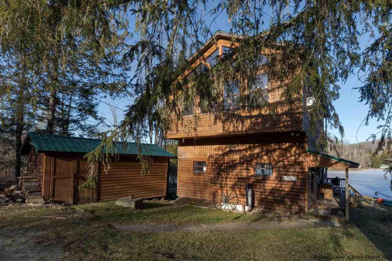 212 Trout Brook Road Roscoe, NY 12776 - Photo 9 of 35 a view of a house with a yard