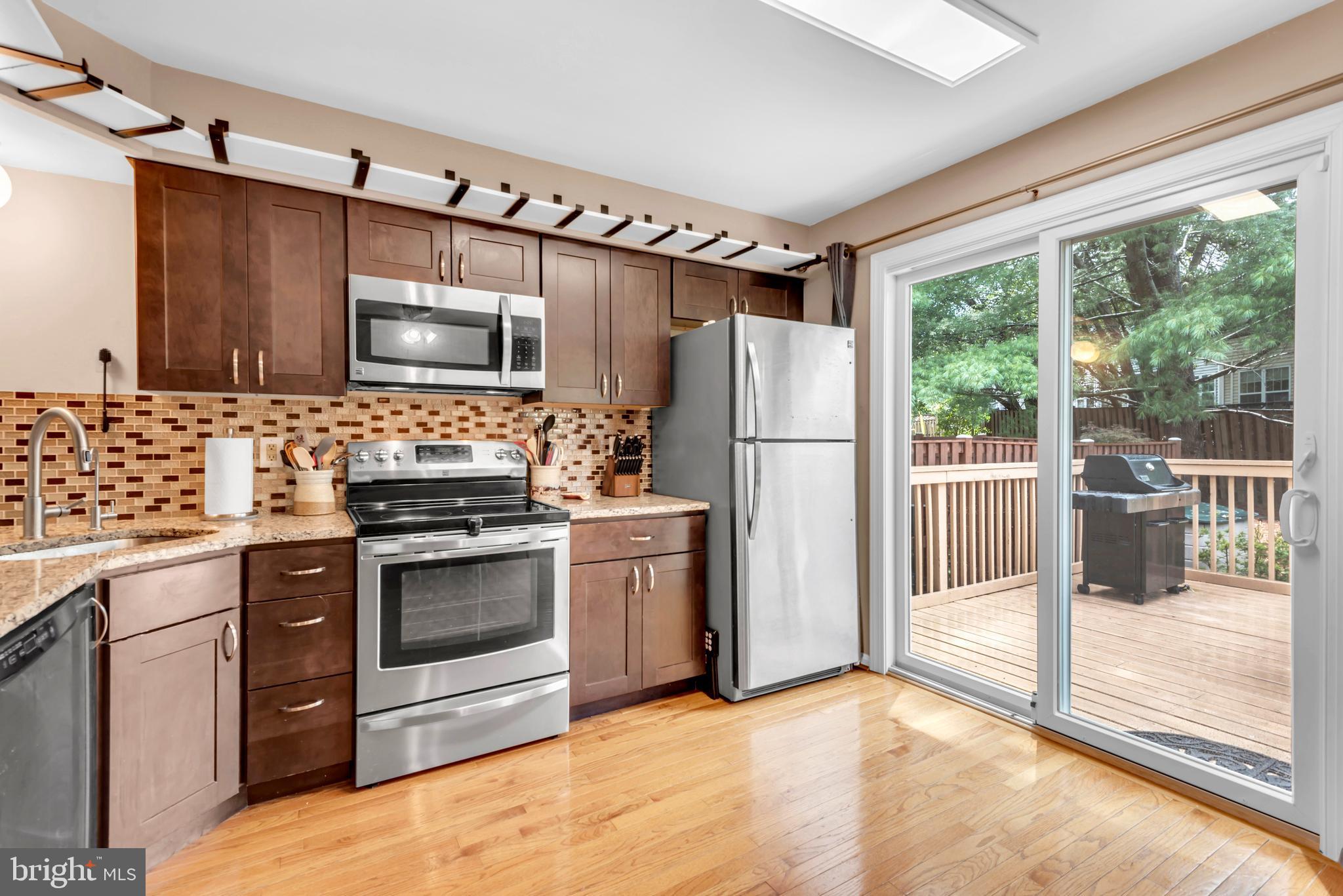 9203 Ridgefield Circle Frederick, MD 21701 - Photo 7 of 33 Bright kitchen leading to back deck