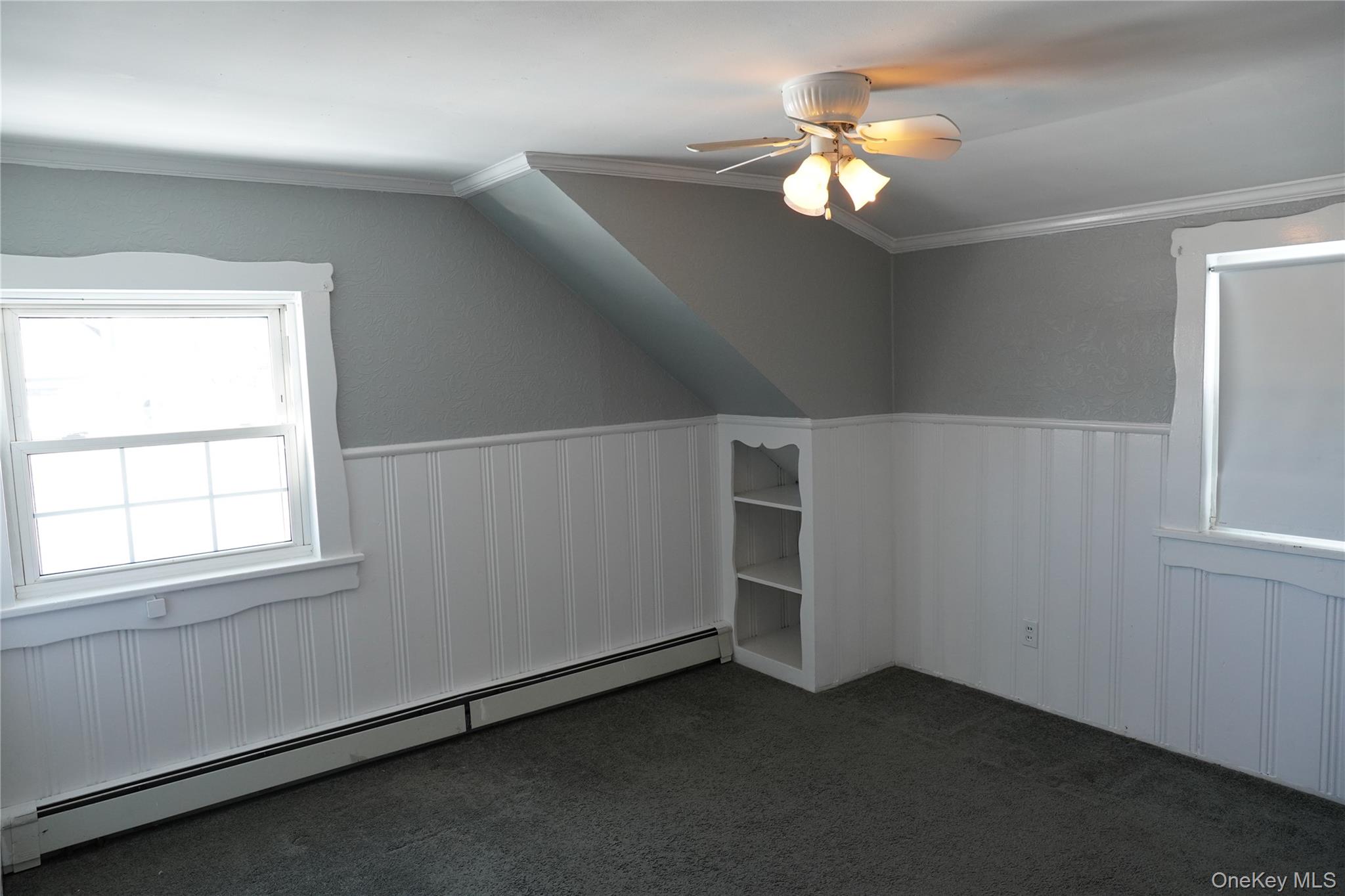 21 Potter Street Patchogue, NY 11772 - Photo 15 of 22 wooden floor in an empty room with a window