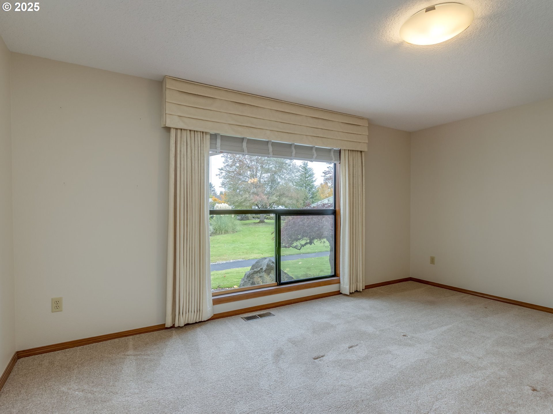 2328 Northeast 156th Place Portland, OR 97230 - Photo 23 of 41 an empty room with sliding door