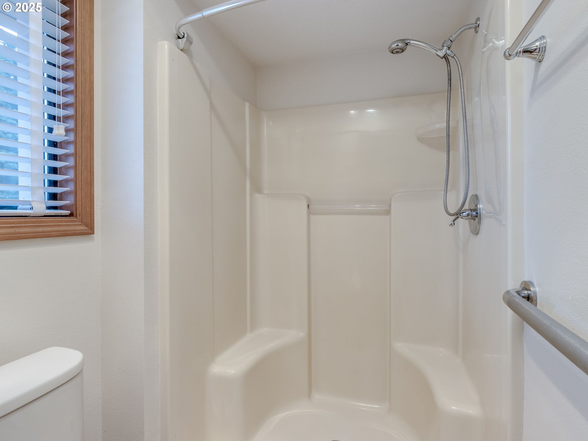 2328 Northeast 156th Place Portland, OR 97230 - Photo 27 of 41 a bathroom with a shower and toilet