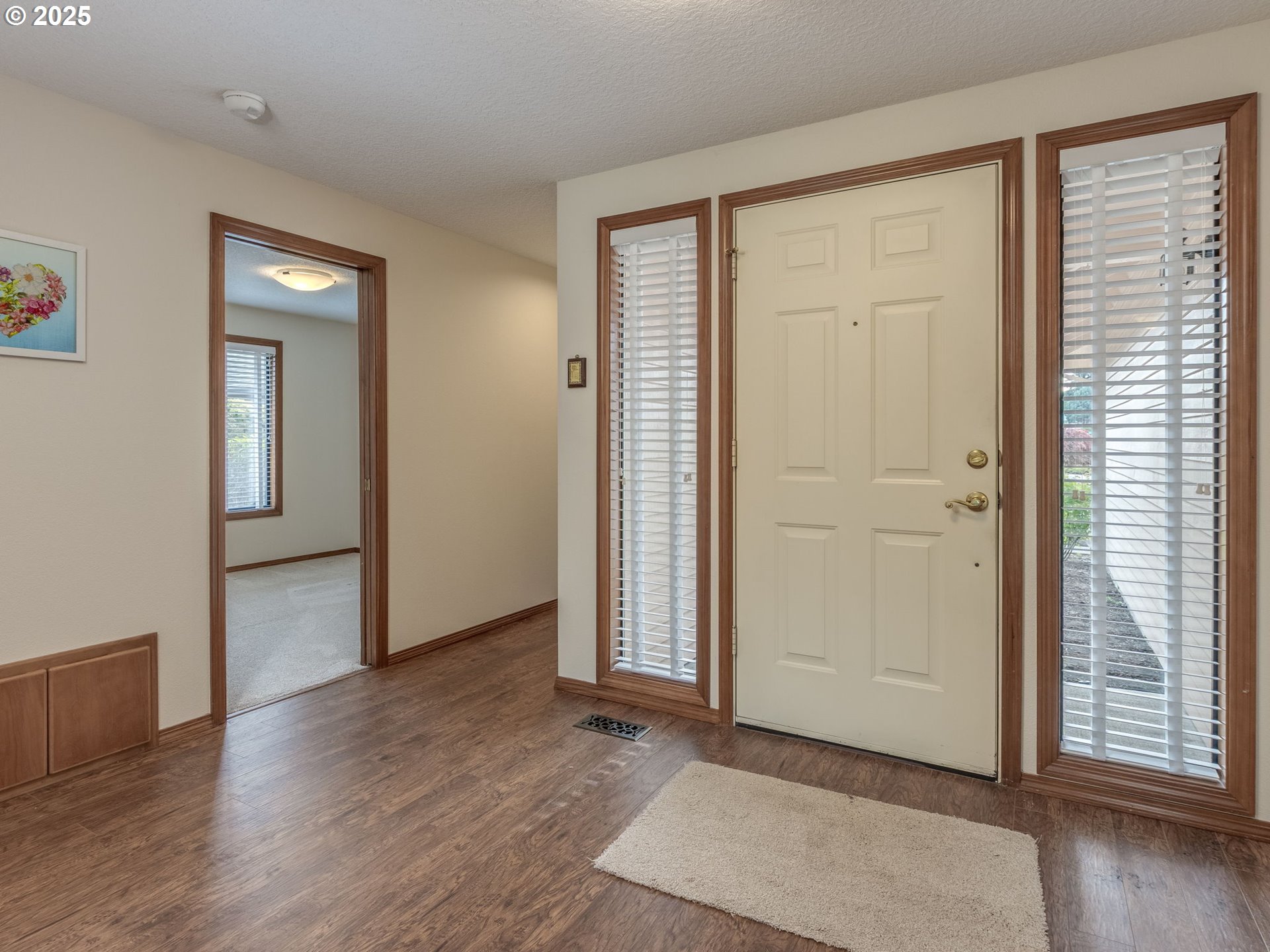 2328 Northeast 156th Place Portland, OR 97230 - Photo 6 of 41 an empty room with wooden floor and windows