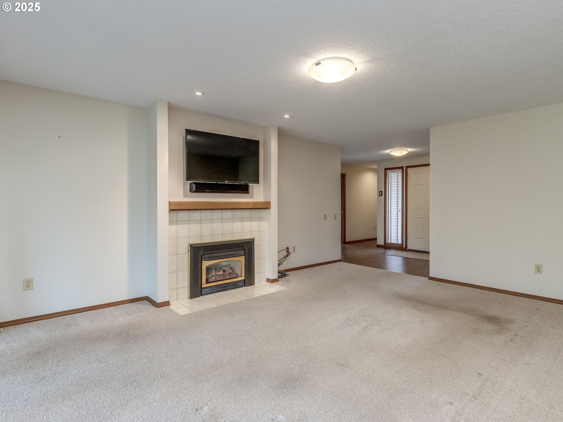 2328 Northeast 156th Place Portland, OR 97230 - Photo 10 of 41 a view of a livingroom with a fireplace