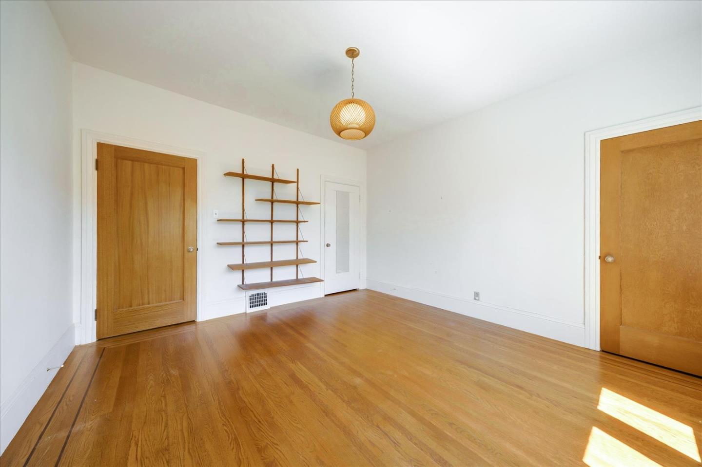167 Almendral Avenue Atherton, CA 94027 - Photo 13 of 50 a view of a room with wooden floor and a window