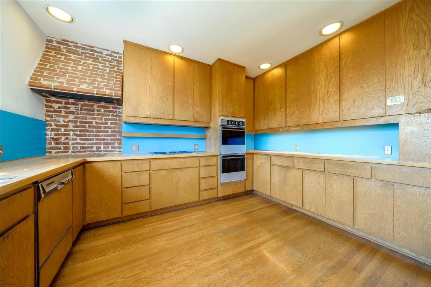 167 Almendral Avenue Atherton, CA 94027 - Photo 20 of 50 a kitchen with sink and cabinets