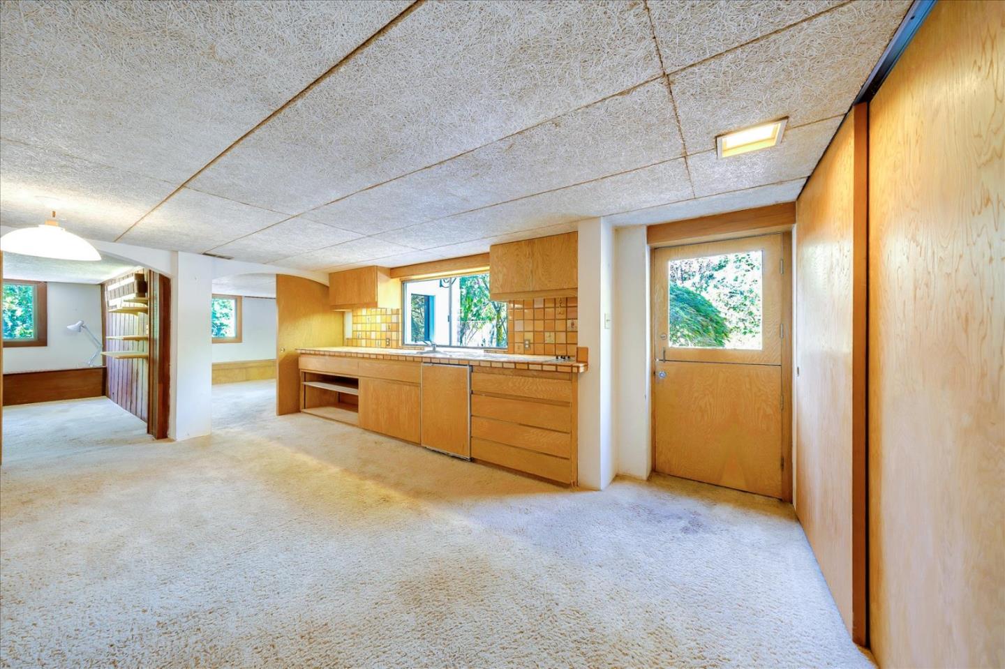 167 Almendral Avenue Atherton, CA 94027 - Photo 21 of 50 a view of a kitchen with a sink and a refrigerator