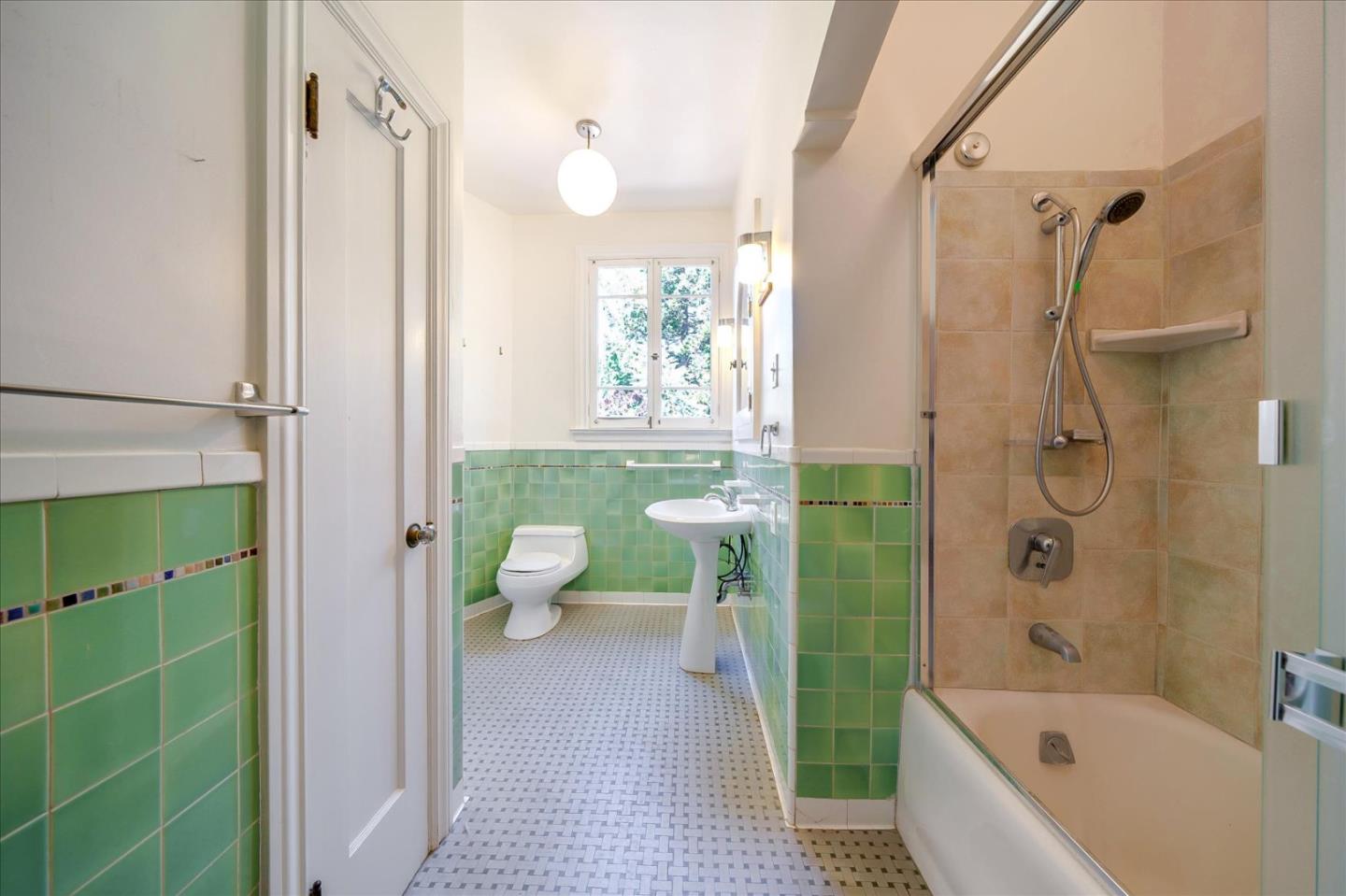 167 Almendral Avenue Atherton, CA 94027 - Photo 25 of 50 a bathroom with a sink a toilet and shower