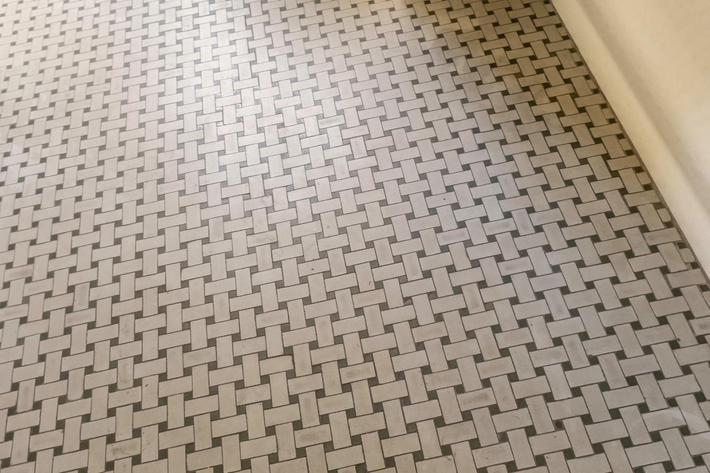 167 Almendral Avenue Atherton, CA 94027 - Photo 26 of 50 a bathroom with a black white checkered and white checkered floor
